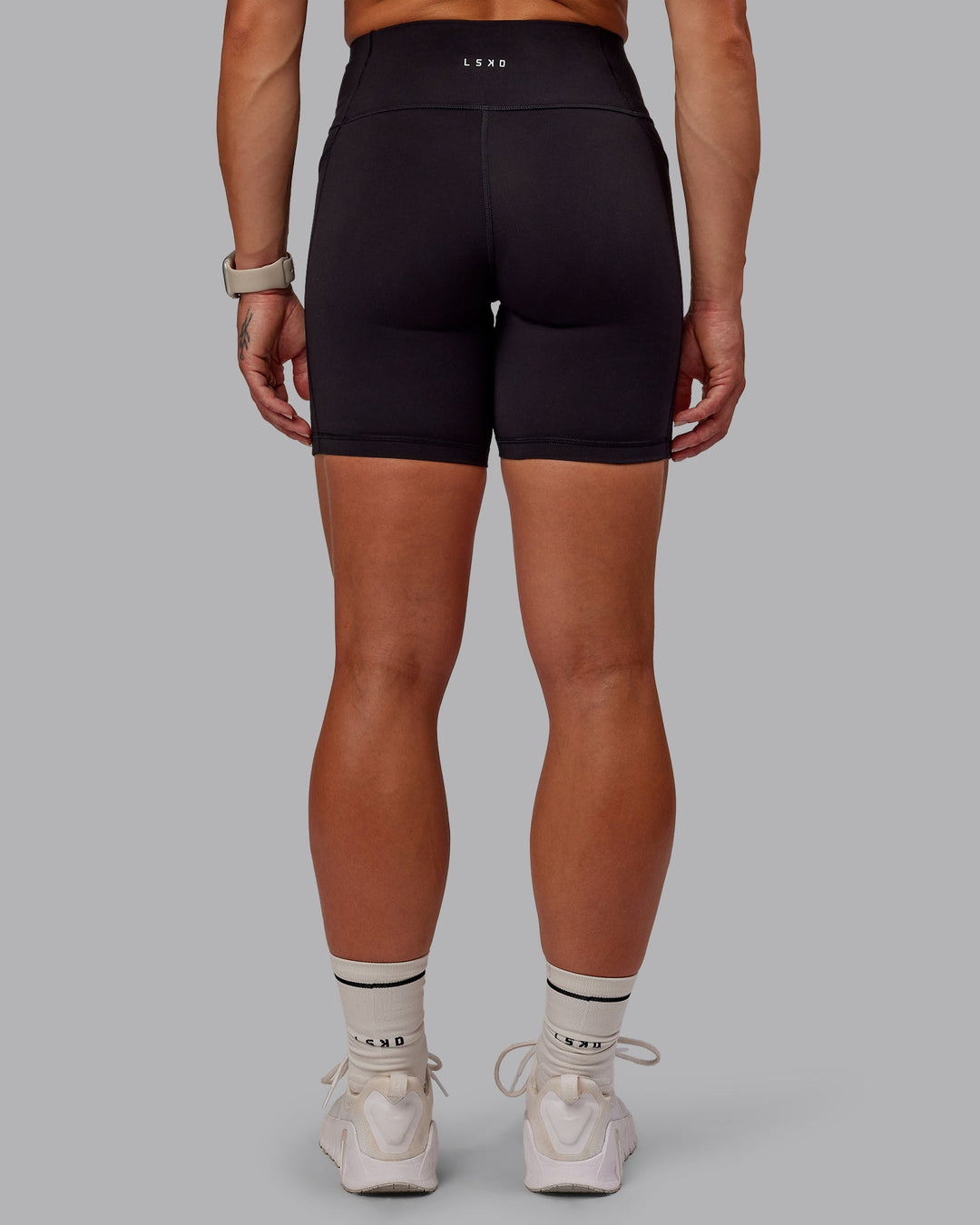 Woman wearing Rep Ultra High-Rise 6&quot; Short Pockets - Black-Surreal Green