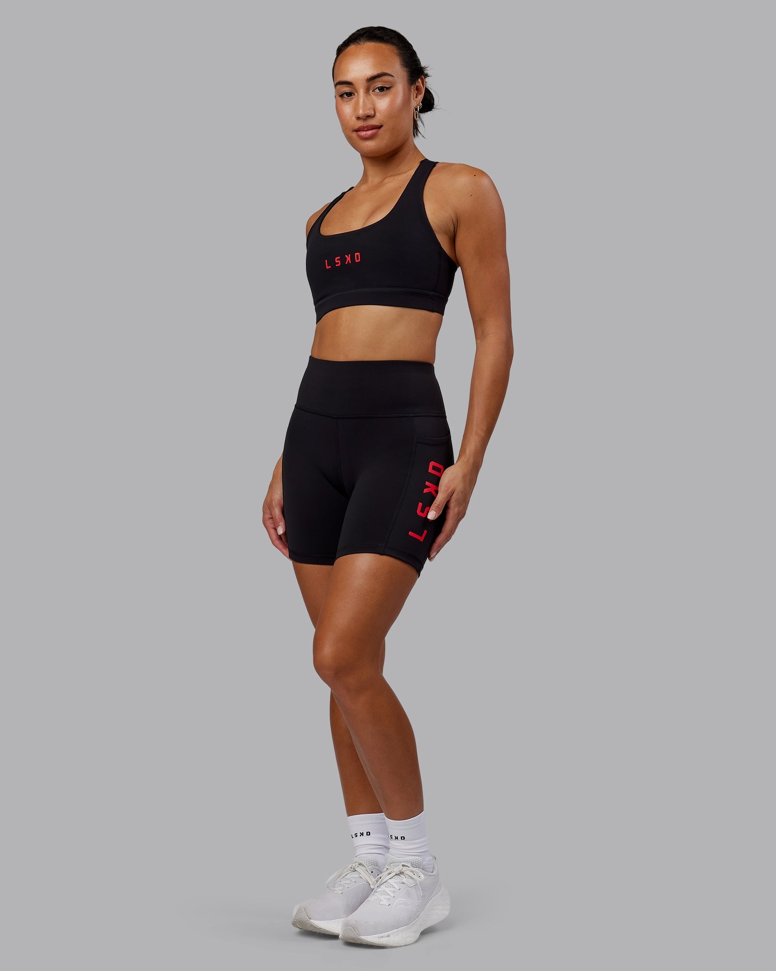 Woman wearing Rep Ultra High-Rise 6" Short Pockets - Black-Scarlet