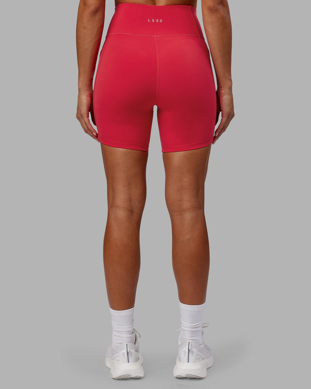 Woman wearing Rep Mid-Length Shorts - Scarlet-White