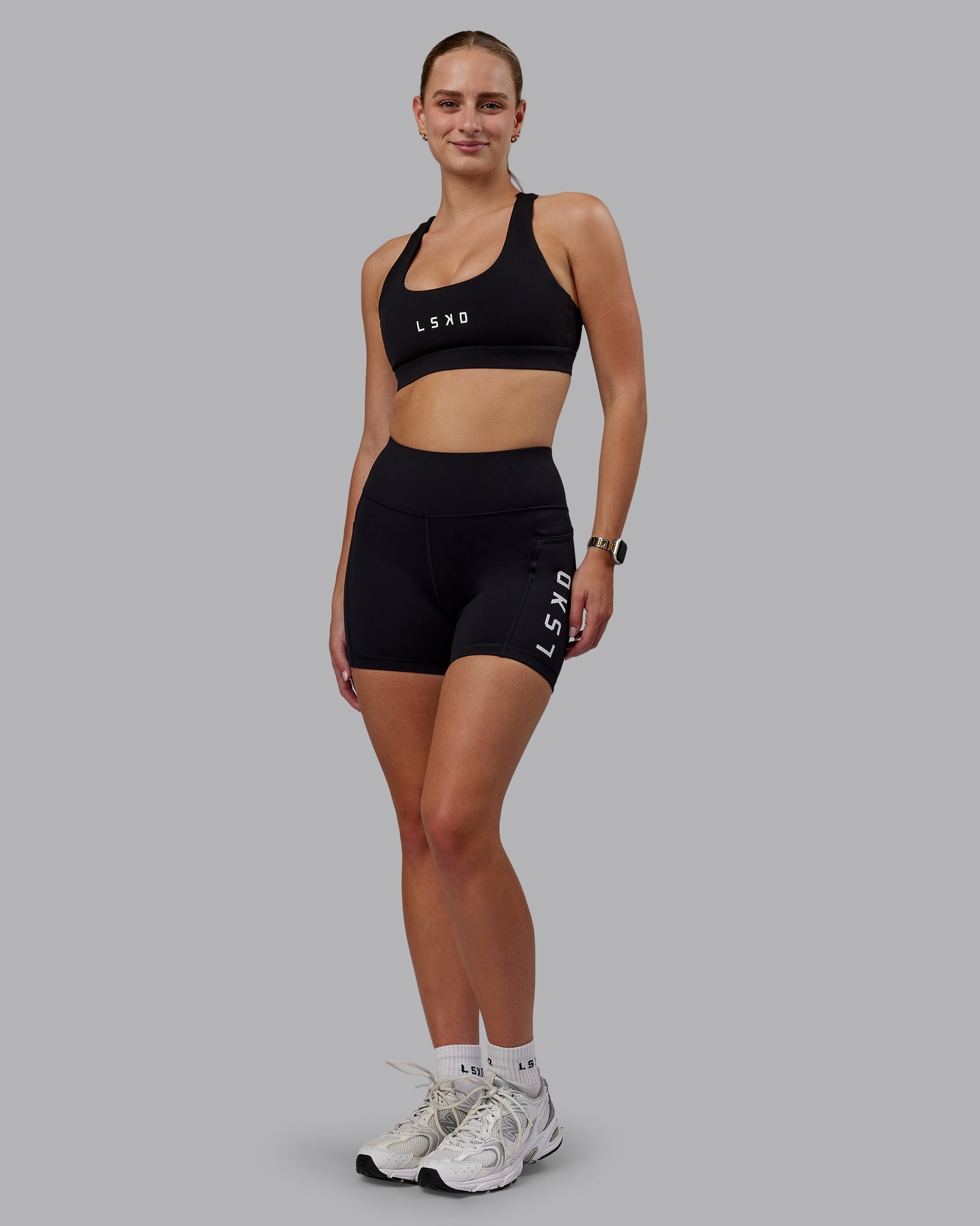 Woman wearing Rep Ultra High-Rise 4" Short Pockets - Black-White