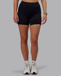 Woman wearing Rep Ultra High-Rise 4" Short Pockets - Black-White