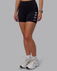 Woman wearing Rep Ultra High-Rise 4" Short Pockets - Black-White