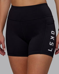 Woman wearing Rep Ultra High-Rise 4" Short Pockets - Black-White