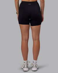 Woman wearing Rep Ultra High-Rise 4" Short Pockets - Black-White