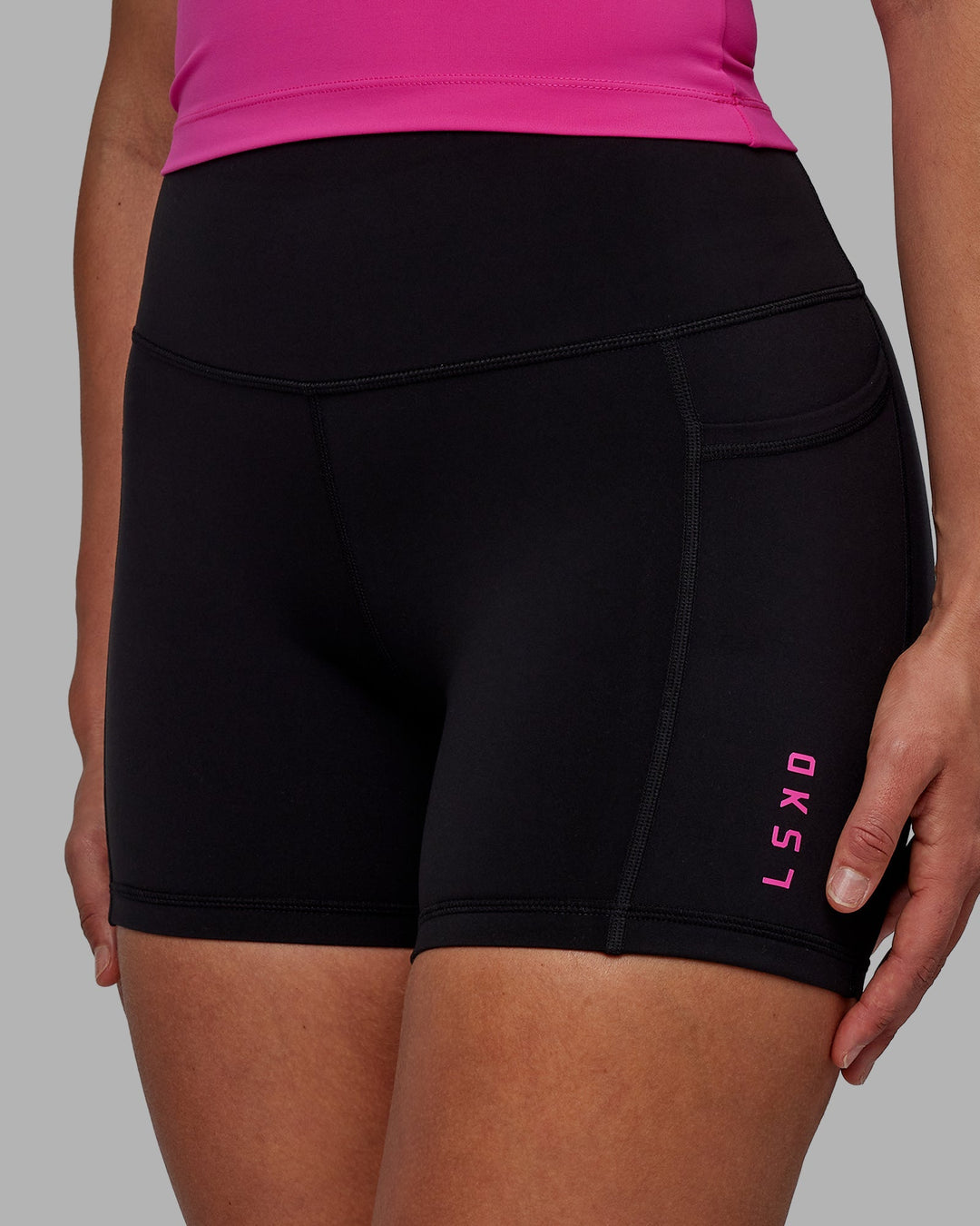 Woman wearing Rep X-Length Shorts - Black-Fuchsia Pink