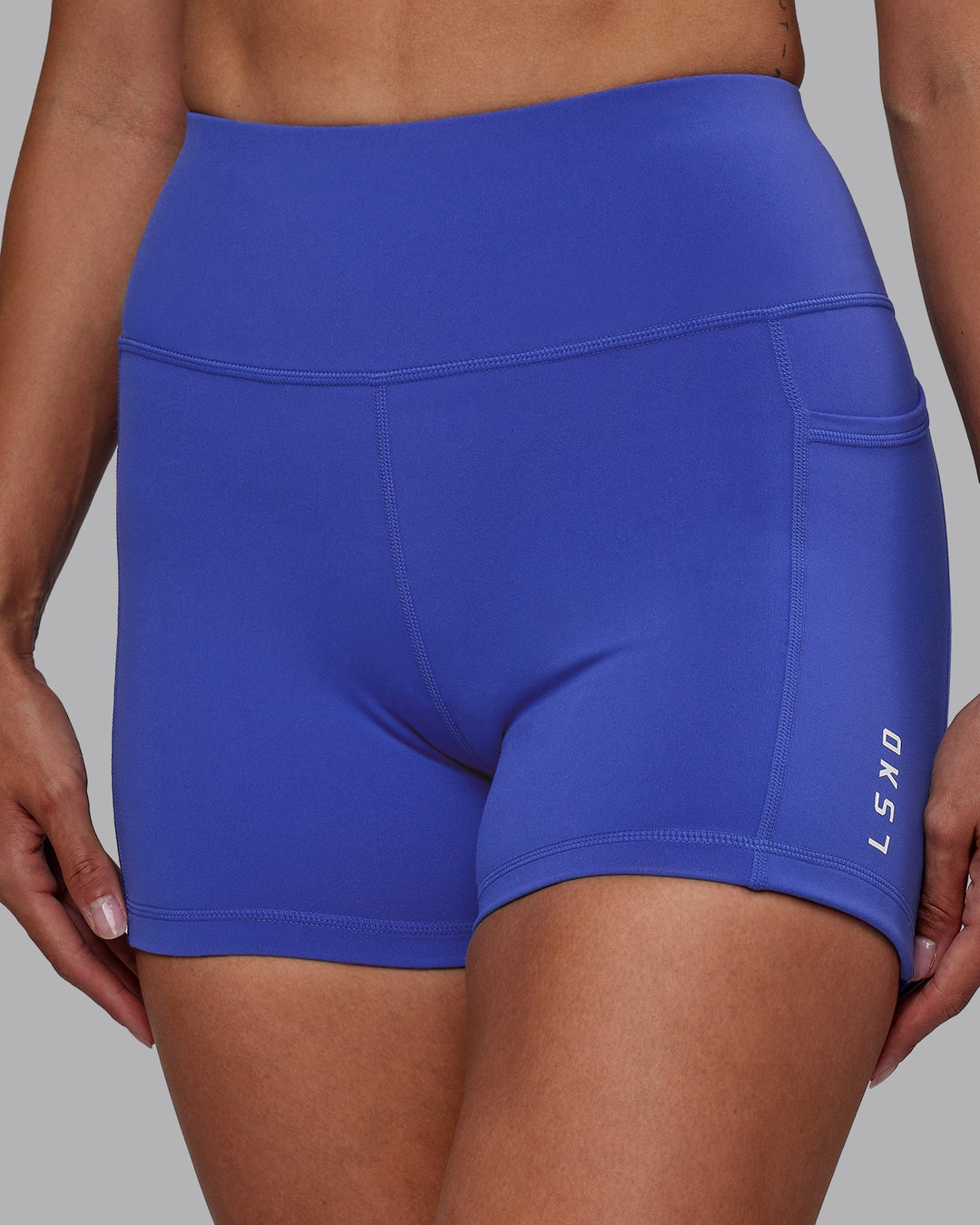 Woman wearing Rep X-Length Shorts - Power Cobalt-White