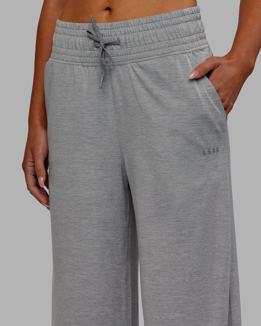 Woman wearing Restore CloudFLX Wide Leg Pants - Light Grey Marl