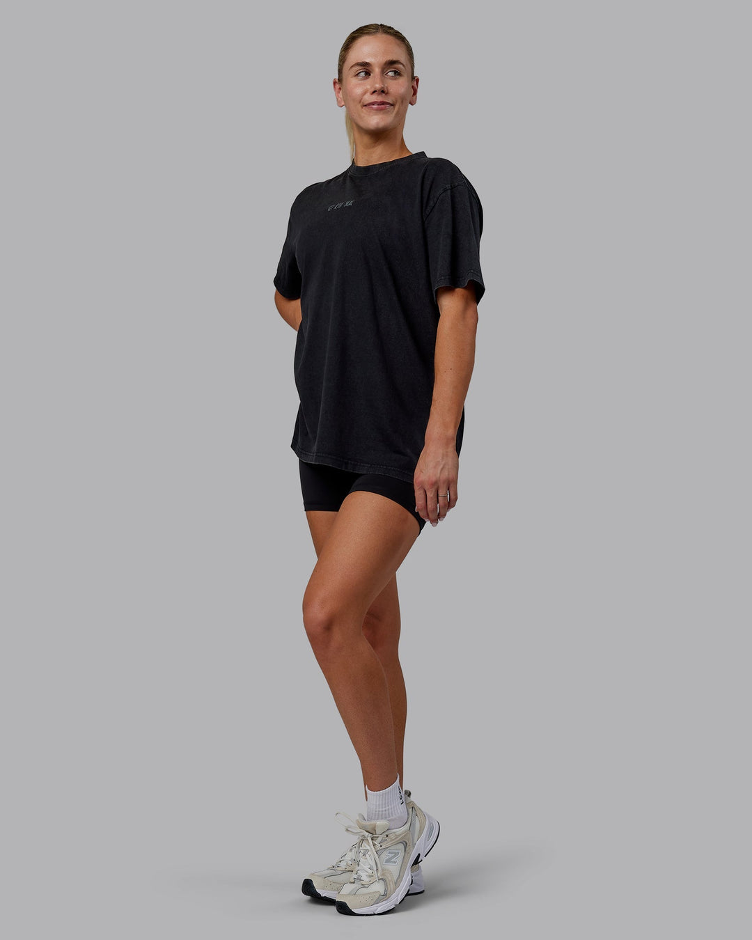 Woman wearing Sara I Can Shall &amp; Will Oversized Washed Tee - Black-Black