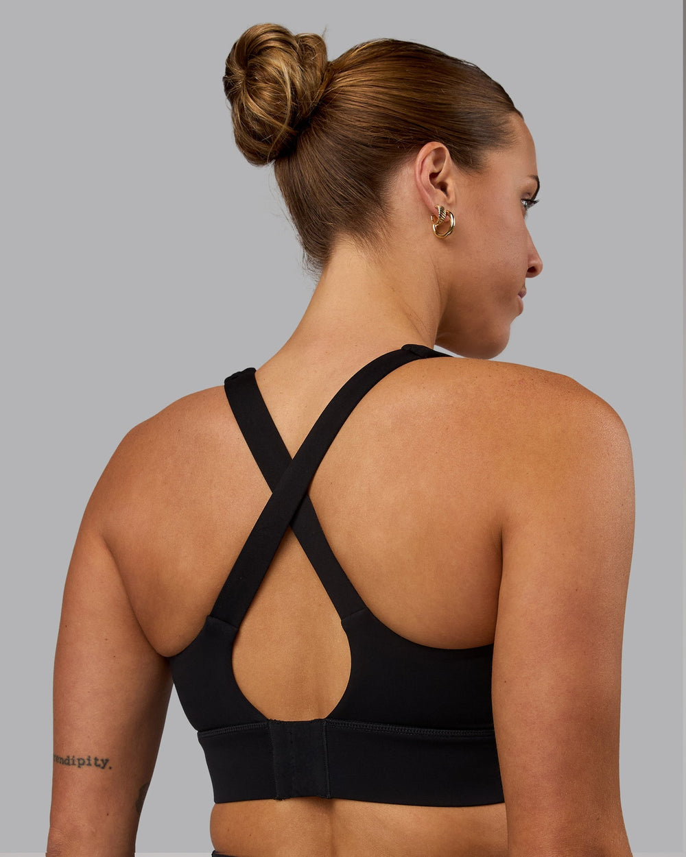 Woman wearing Sculpt Sports Bra - Black