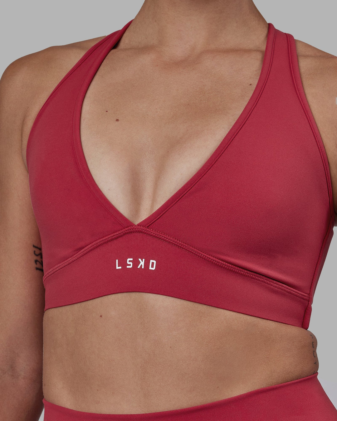 Woman wearing Stamina Sports Bra - Claret