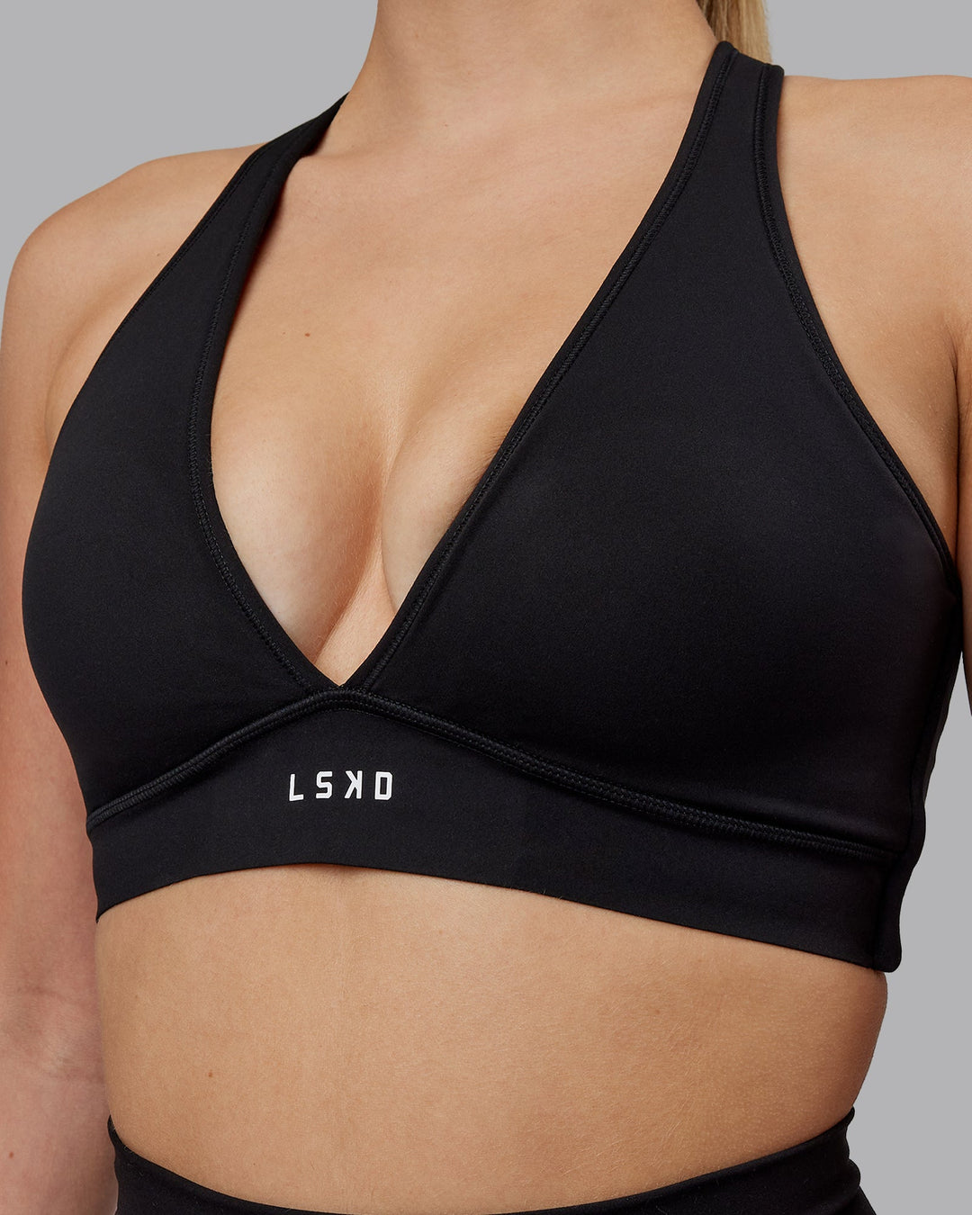 Woman wearing Stamina Sports Bra (D/DD/E) - Black