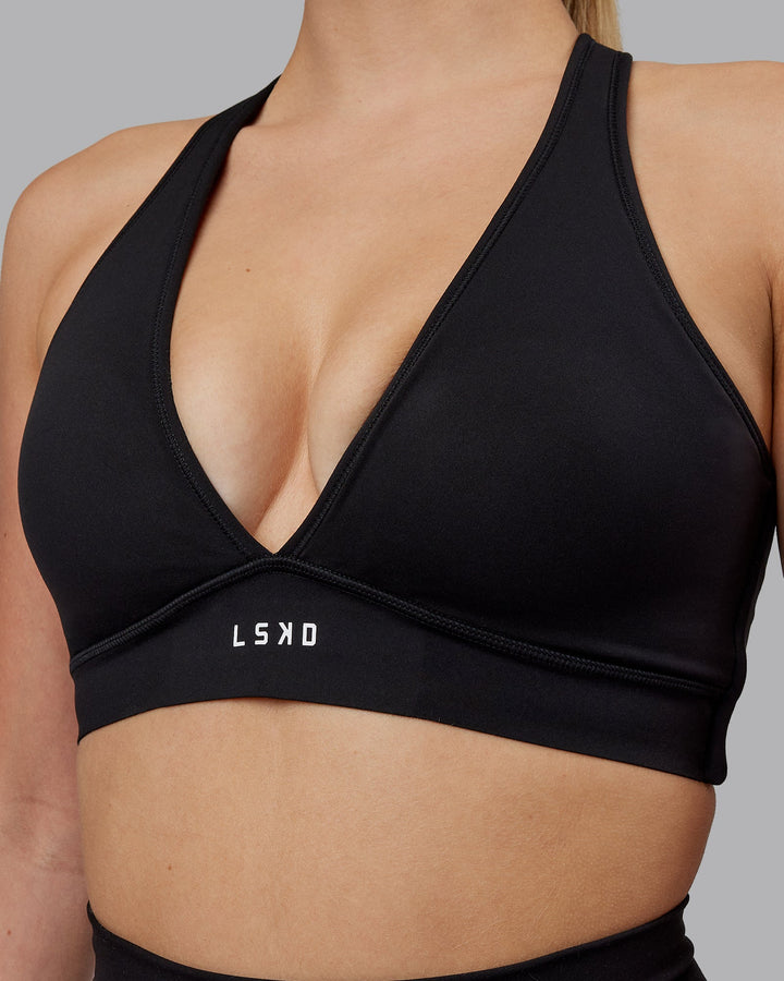 Woman wearing Stamina Sports Bra (D/DD/E) - Black
