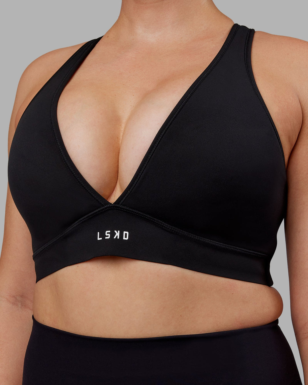 Woman wearing Stamina Sports Bra (D/DD/E) - Black