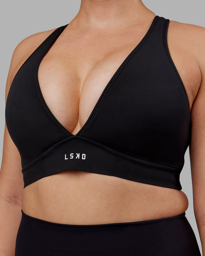 Woman wearing Stamina Sports Bra (D/DD/E) - Black
