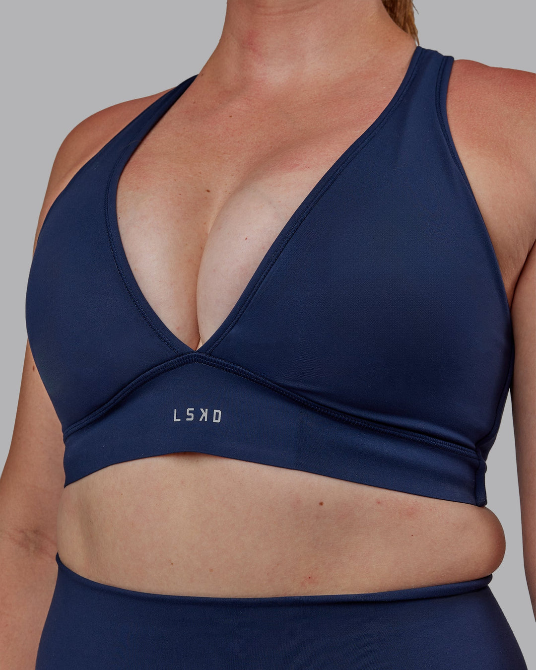 Woman wearing Stamina Sports Bra (D/DD/E) - Future Navy