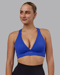 Woman wearing Stamina Sports Bra (D/DD/E) - Power Cobalt | Thumbnail Index: 2