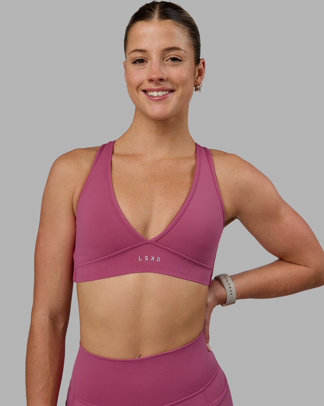 Woman wearing Stamina Sports Bra - Mauve Haze