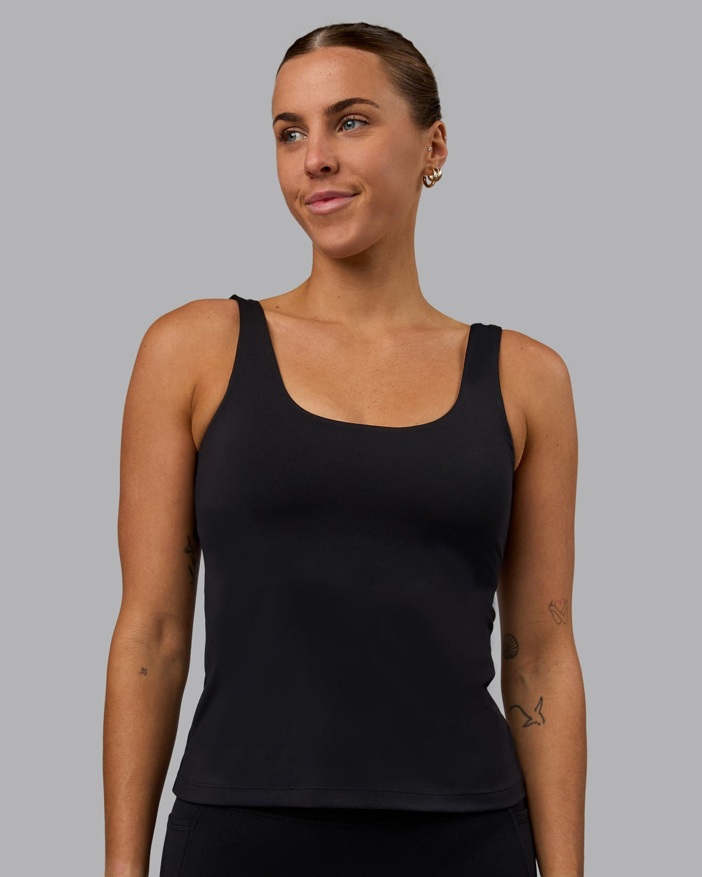 Woman wearing Staple Active Shelf Bra Tank - Black