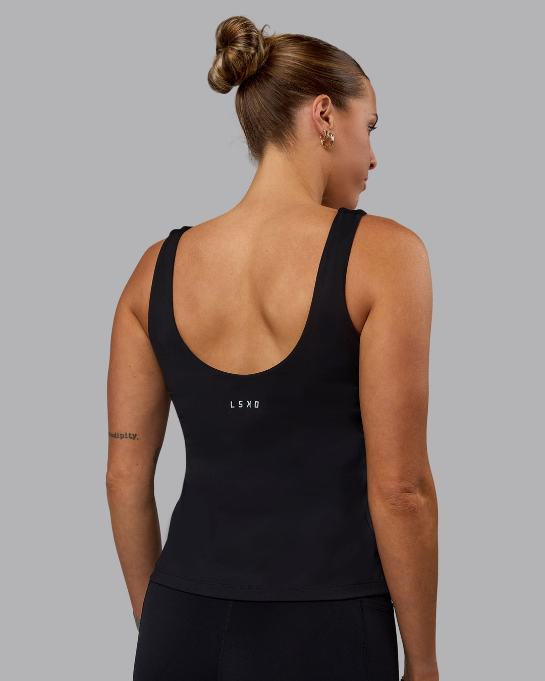 Woman wearing Staple Active Shelf Bra Tank - Black