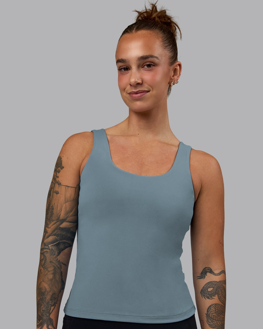 Woman wearing Staple Active Shelf Bra Tank - Elemental Blue