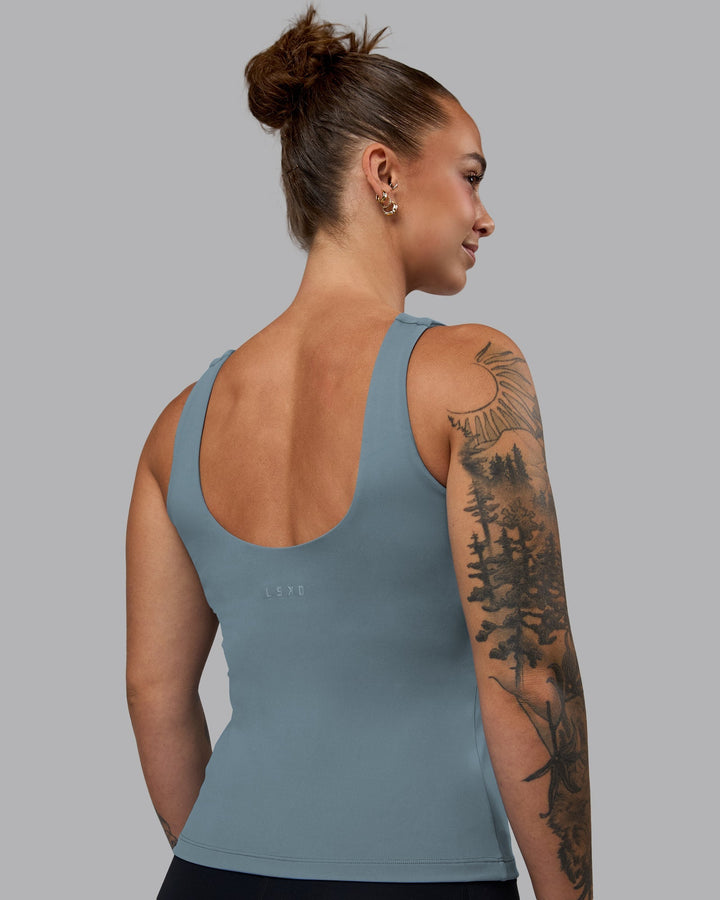 Woman wearing Staple Active Shelf Bra Tank - Elemental Blue
