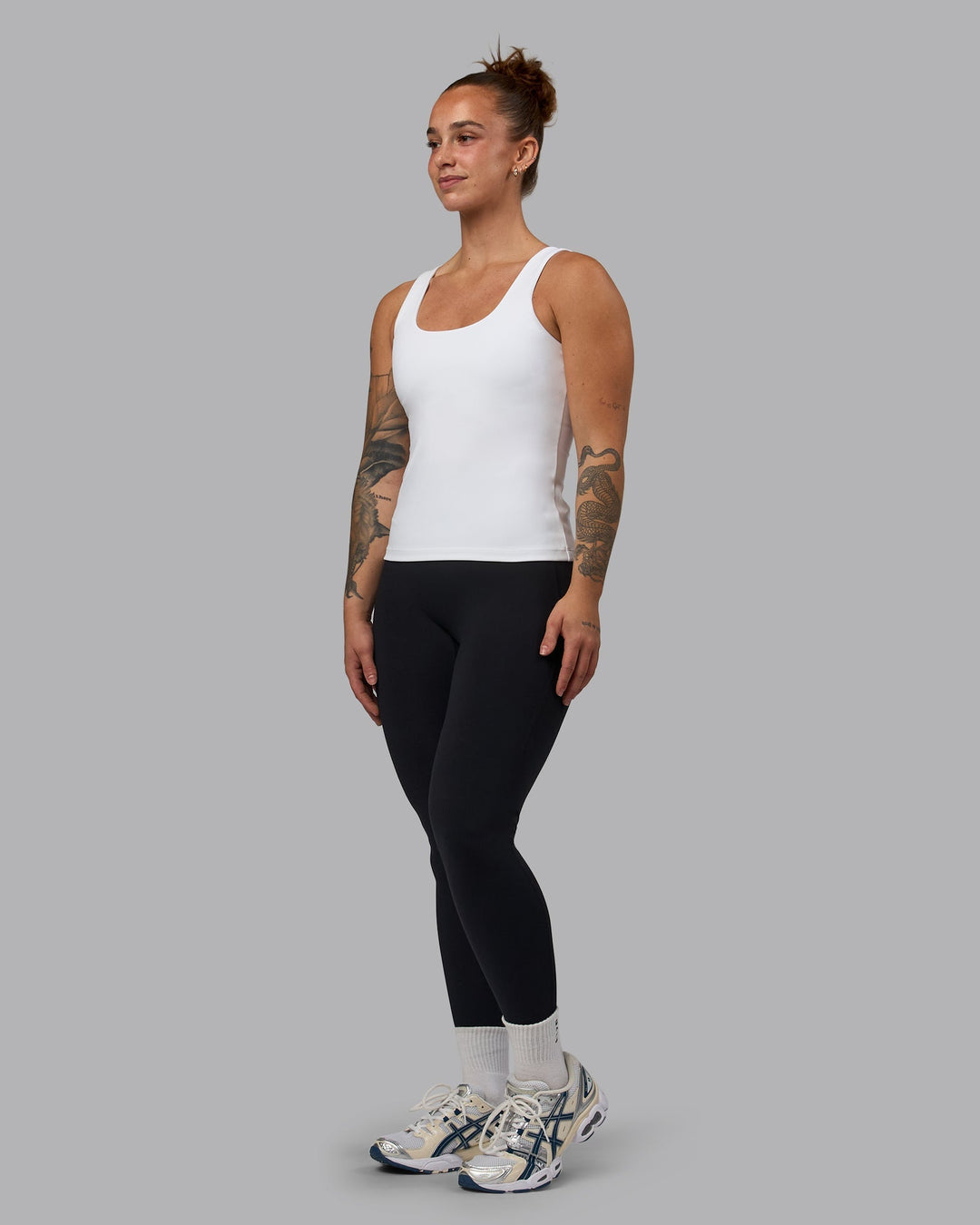 Woman wearing Staple Active Shelf Bra Tank - White