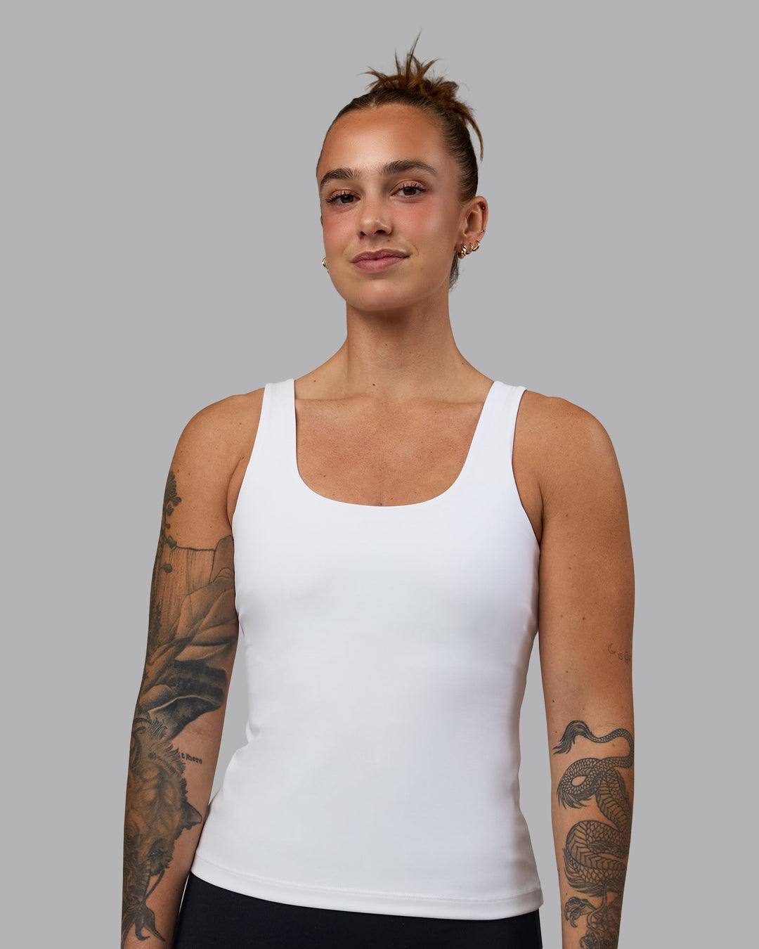 Woman wearing Staple Active Shelf Bra Tank - White