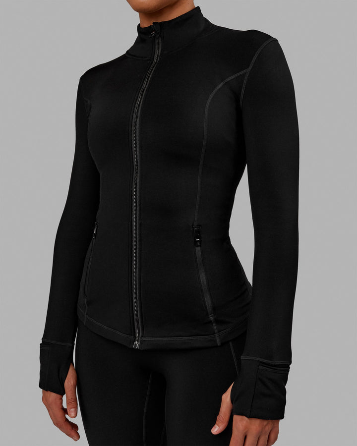 Woman wearing Stride Zip Through Thermal Jacket - Black
