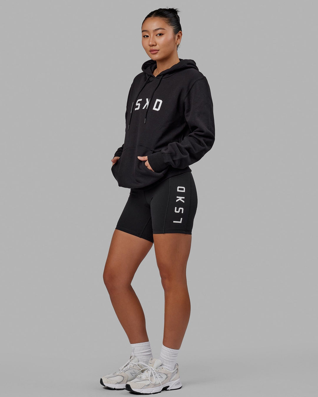 Woman wearing Unisex Structure Hoodie - Black-White