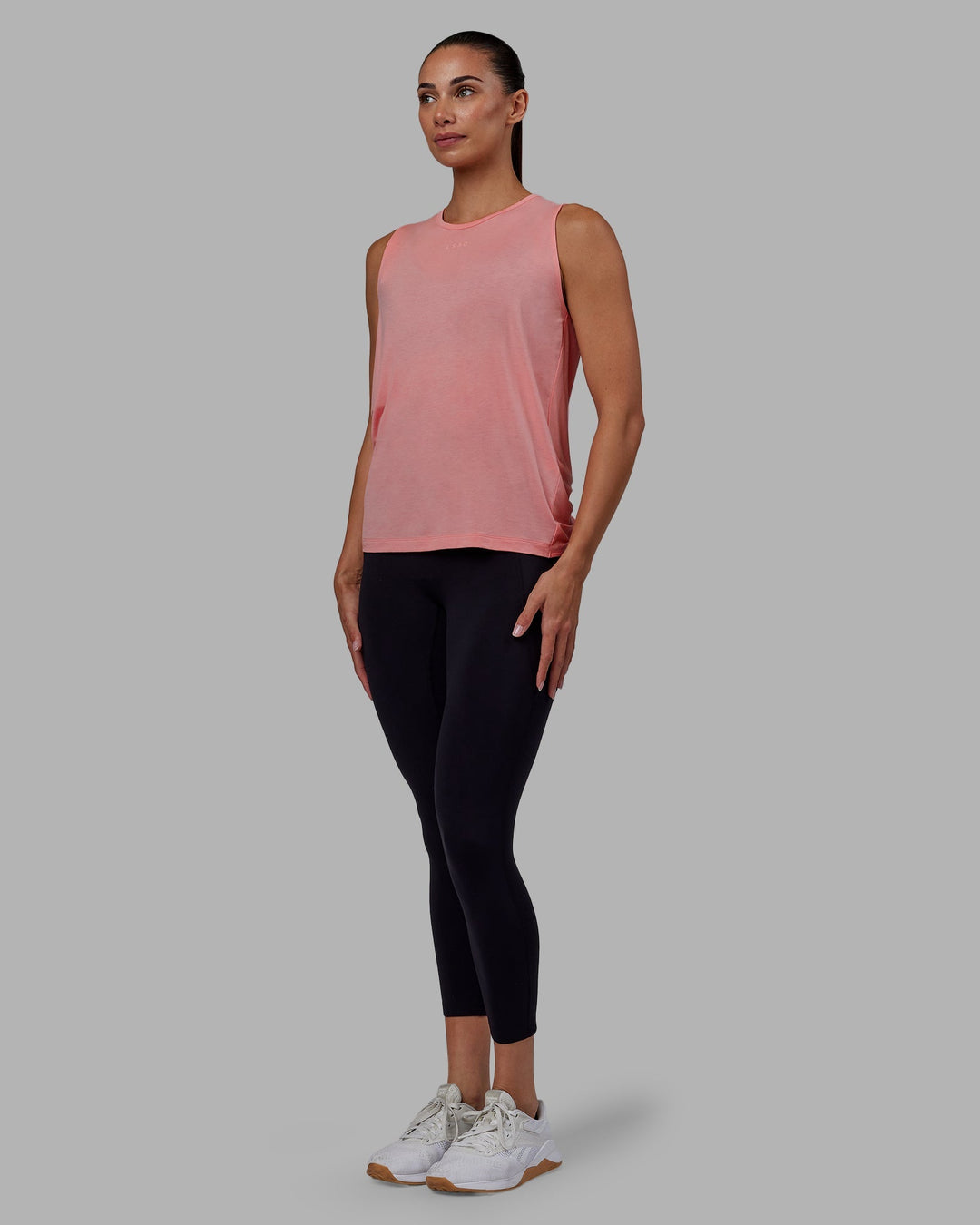 Woman wearing Swivel Open Back Tank - Murex Shell