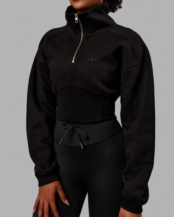 Woman wearing Thrive Corset 1/4 Zip Sweater - Black
