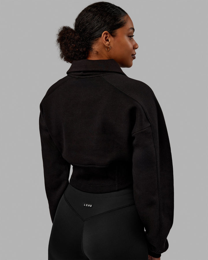 Woman wearing Thrive Corset 1/4 Zip Sweater - Black
