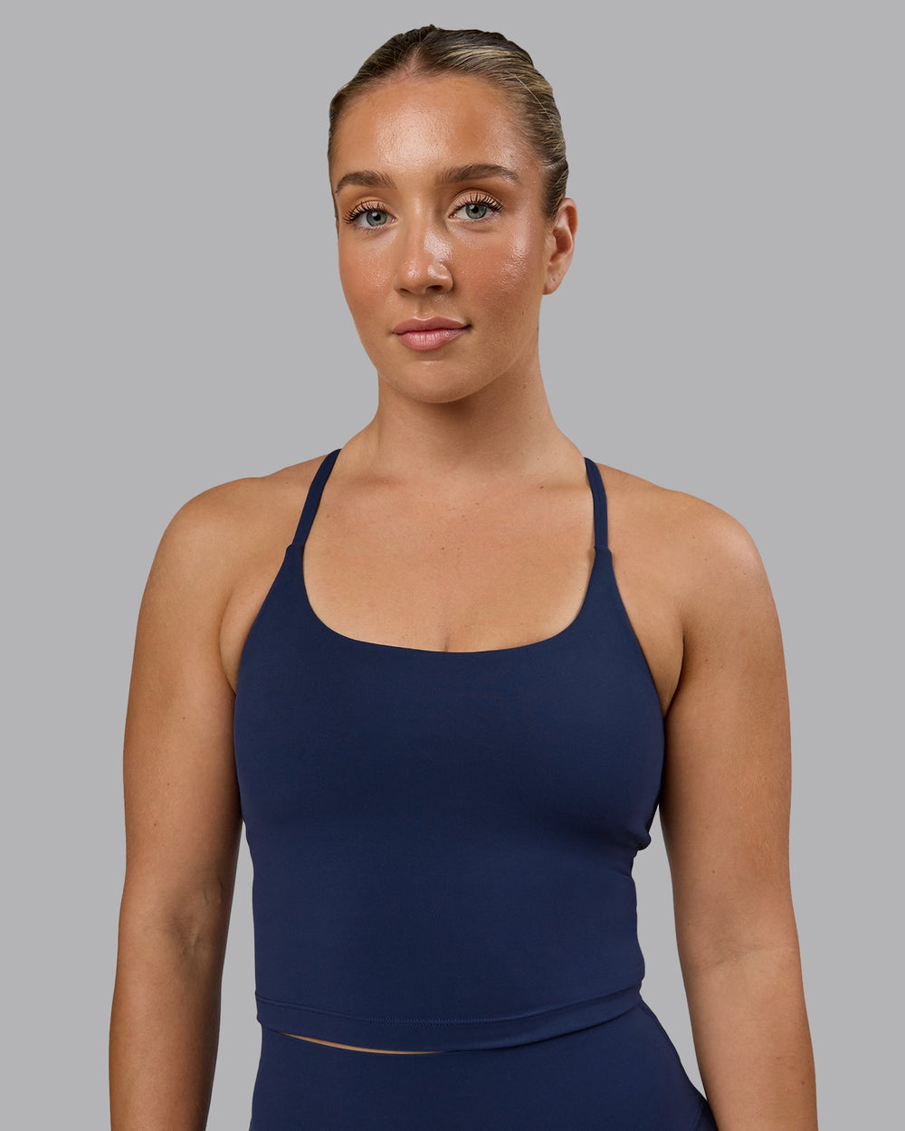 Woman wearing Twist Shelf Bra Tank - Future Navy