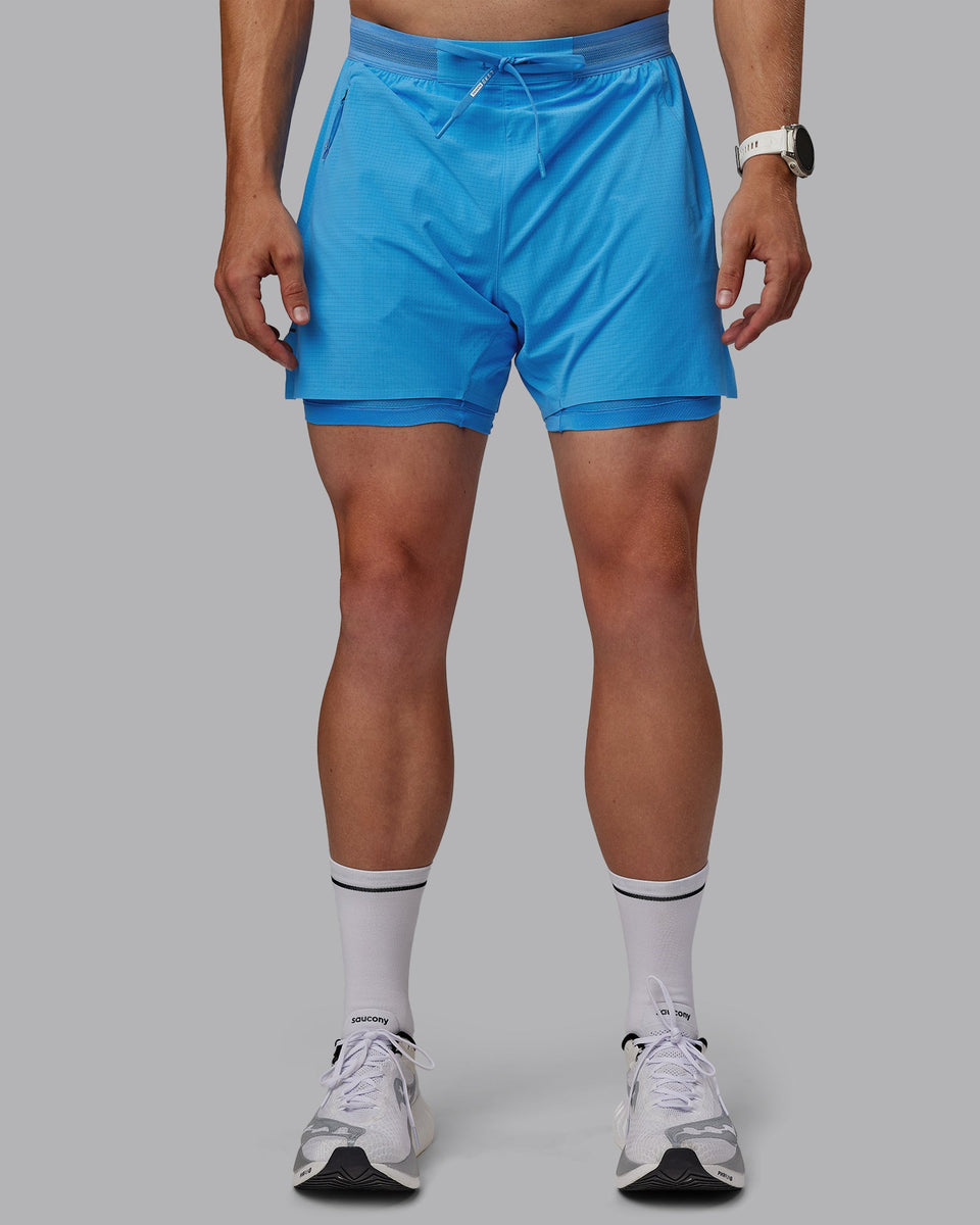 Man wearing UltraAir 5" Lined Performance Shorts - Azure Blue