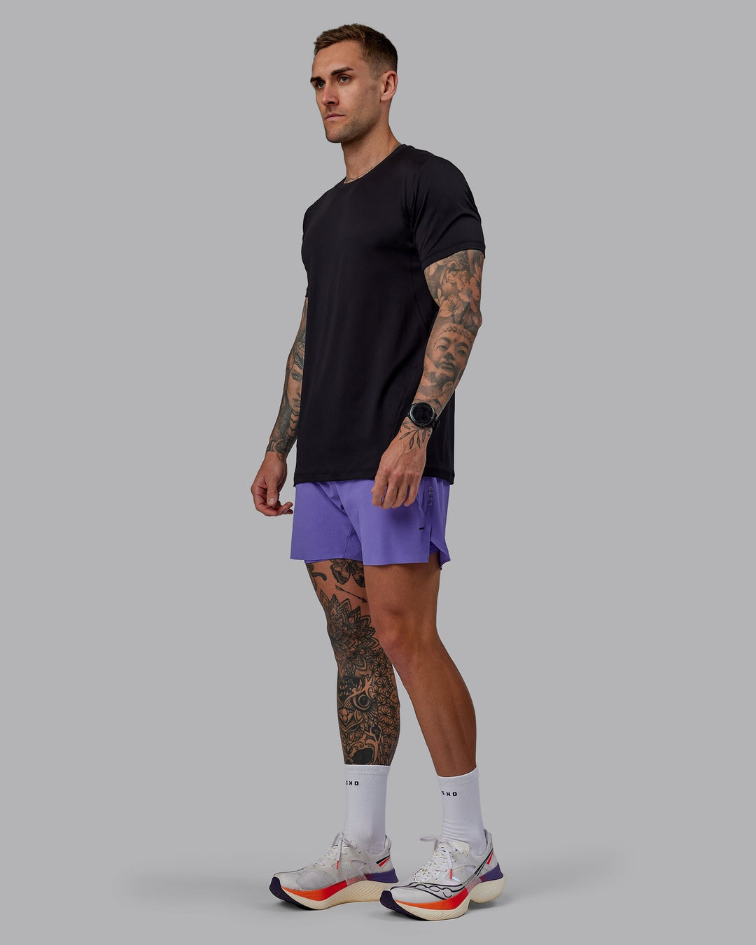 Man wearing UltraAir 5&quot; Lined Performance Shorts - Dahlia Purple