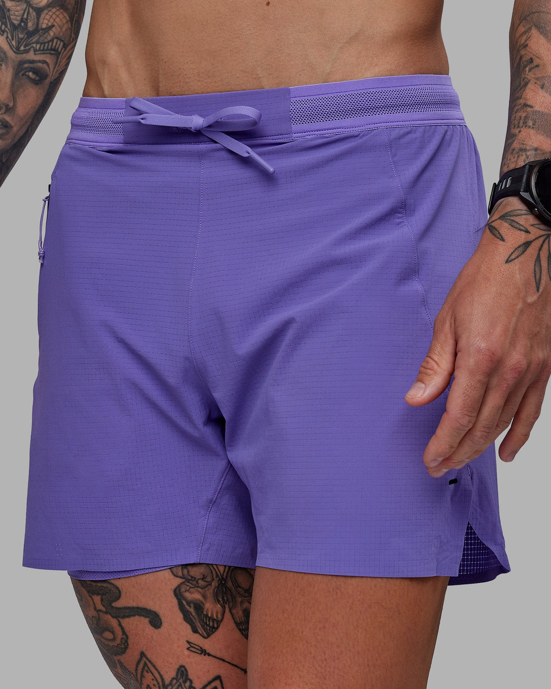 Man wearing UltraAir 5&quot; Lined Performance Shorts - Dahlia Purple