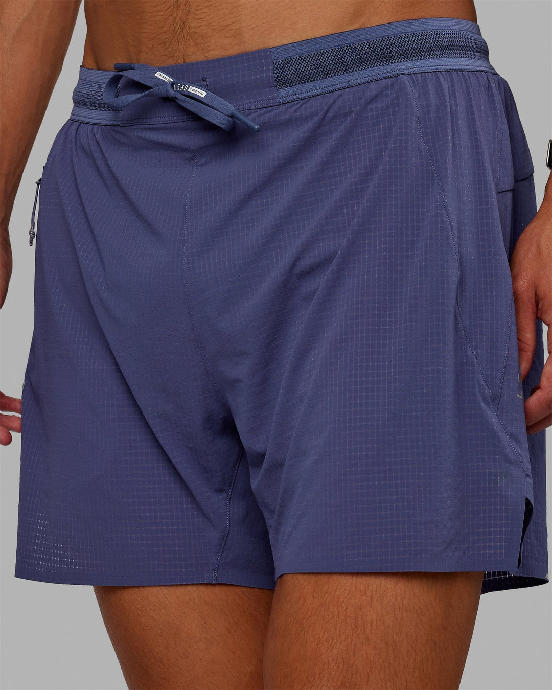 Man wearing UltraAir 5&quot; Lined Performance Shorts - Future Dusk-Reflective