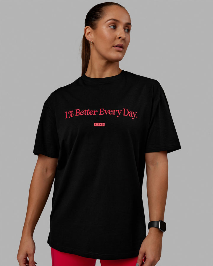 Woman wearing Unisex 1% Better FLXCotton Tee Oversize - Black-Scarlet