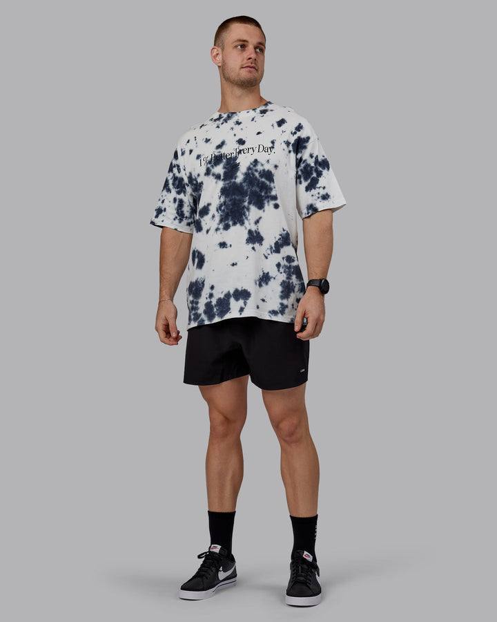 Man wearing Unisex 1% Better Heavyweight Oversize Tee - White-Black Tie Dye
