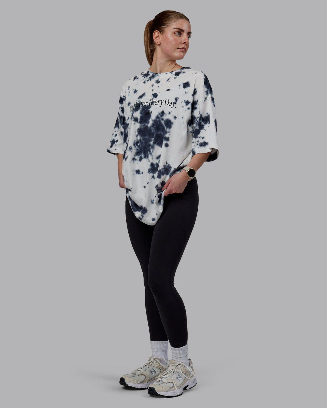 Woman wearing Unisex 1% Better Heavyweight Oversize Tee - White-Black Tie Dye