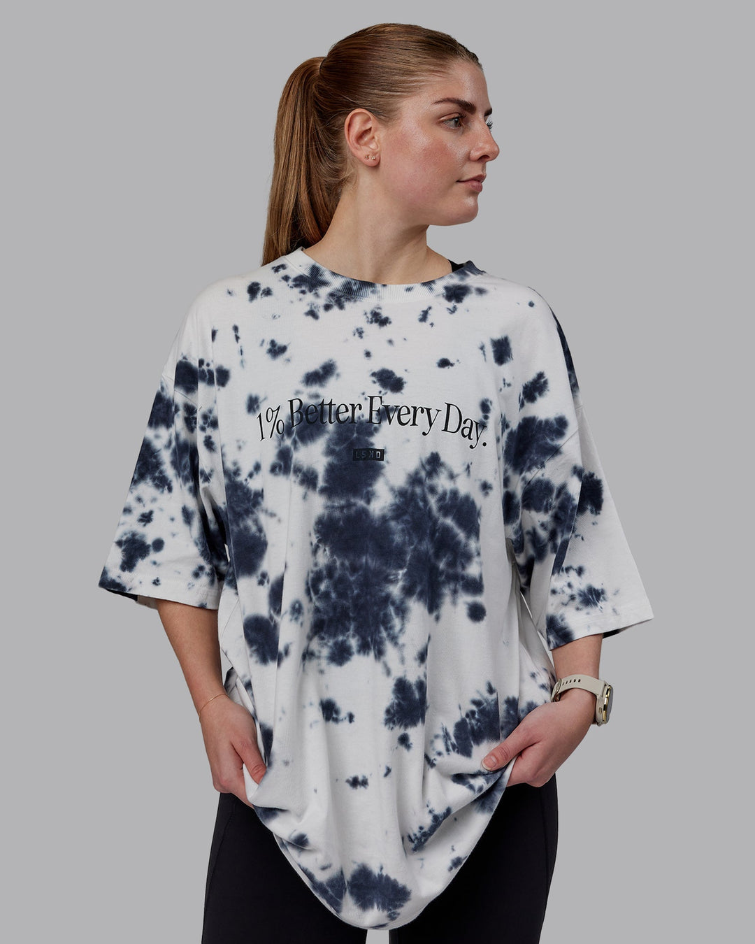 Woman wearing Unisex 1% Better Heavyweight Oversize Tee - White-Black Tie Dye