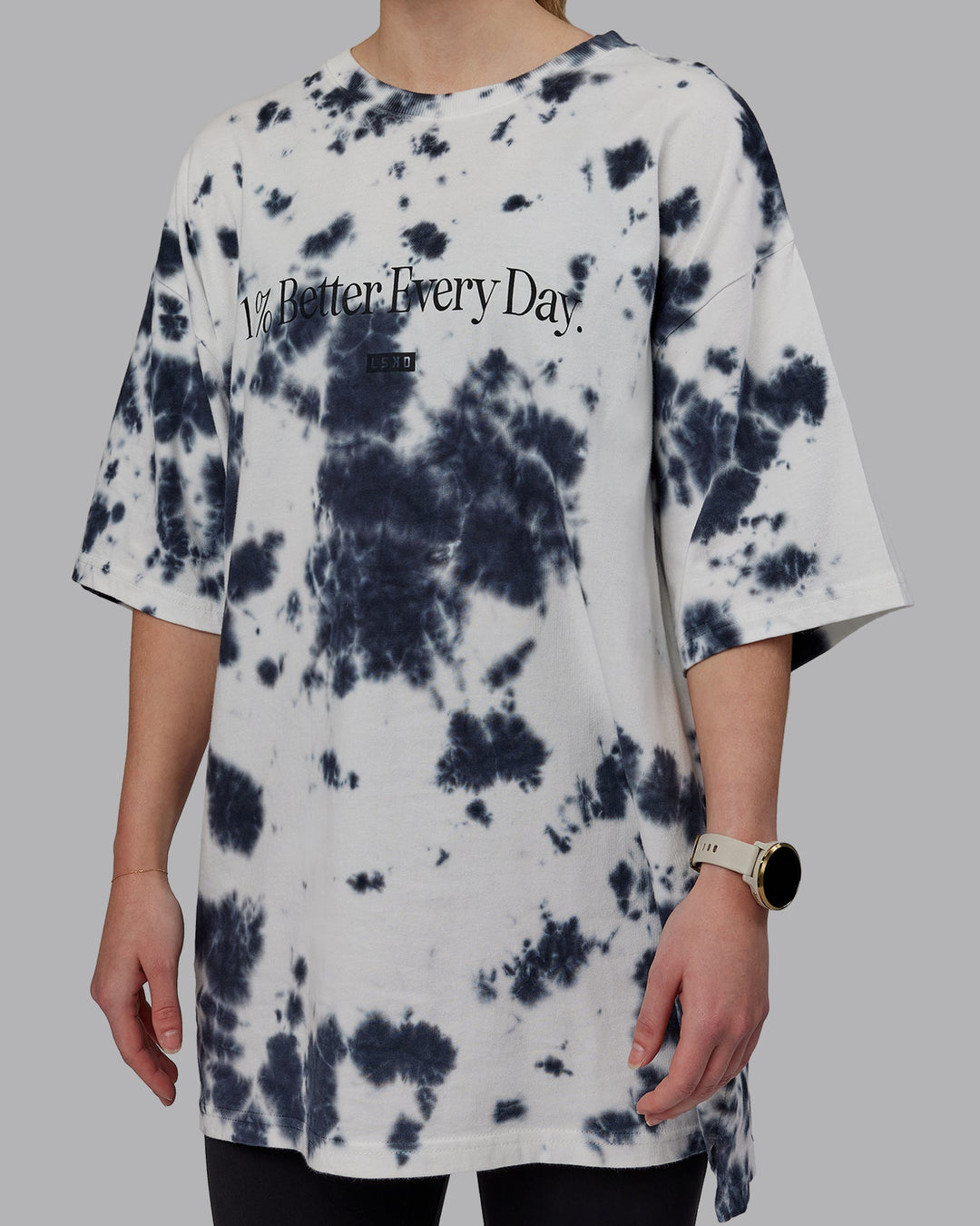 Woman wearing Unisex 1% Better Heavyweight Oversize Tee - White-Black Tie Dye