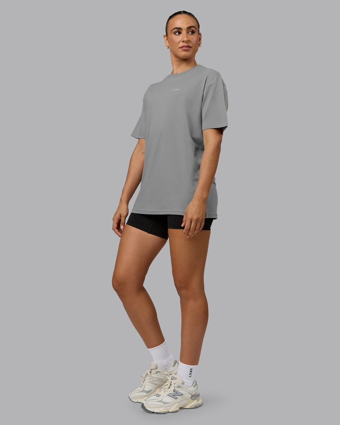 Woman wearing Unisex 1% Better Value Series FLXCotton Tee Oversize - Circular Grey-White