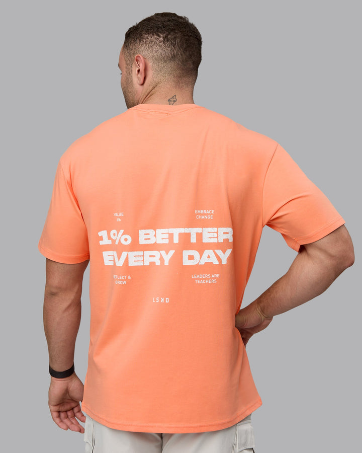 Man wearing Unisex 1% Better Value Series FLXCotton Tee Oversize - Mellow Peach-White
