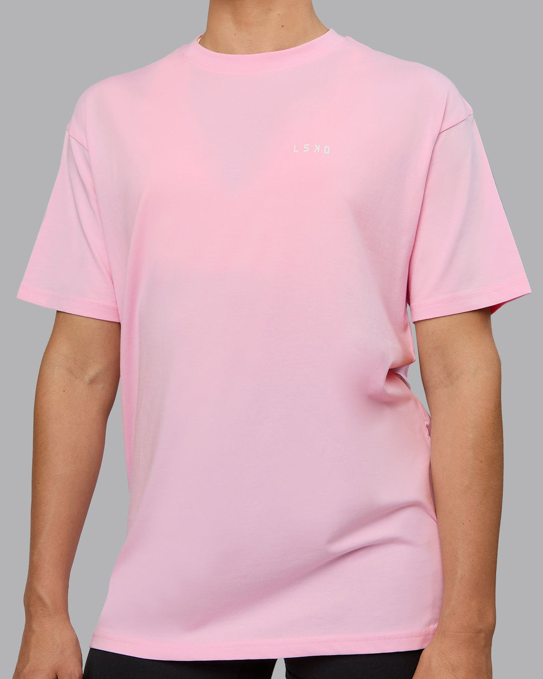 Woman wearing Unisex 1% Better Value Series FLXCotton Tee Oversize - Pale Pink-White