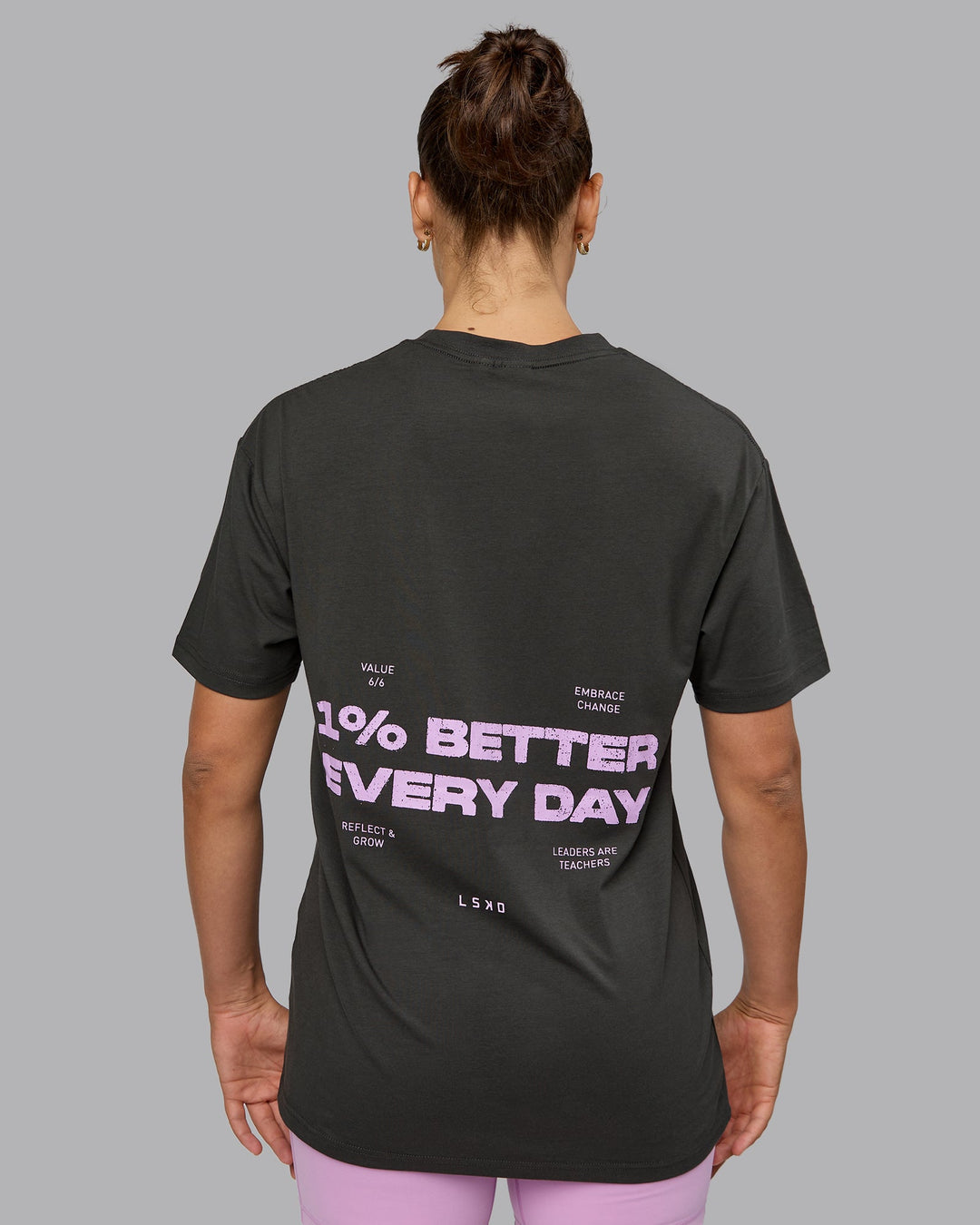 Woman wearing Unisex 1% Better Value Series FLXCotton Tee Oversize - Pirate Black-Light Violet