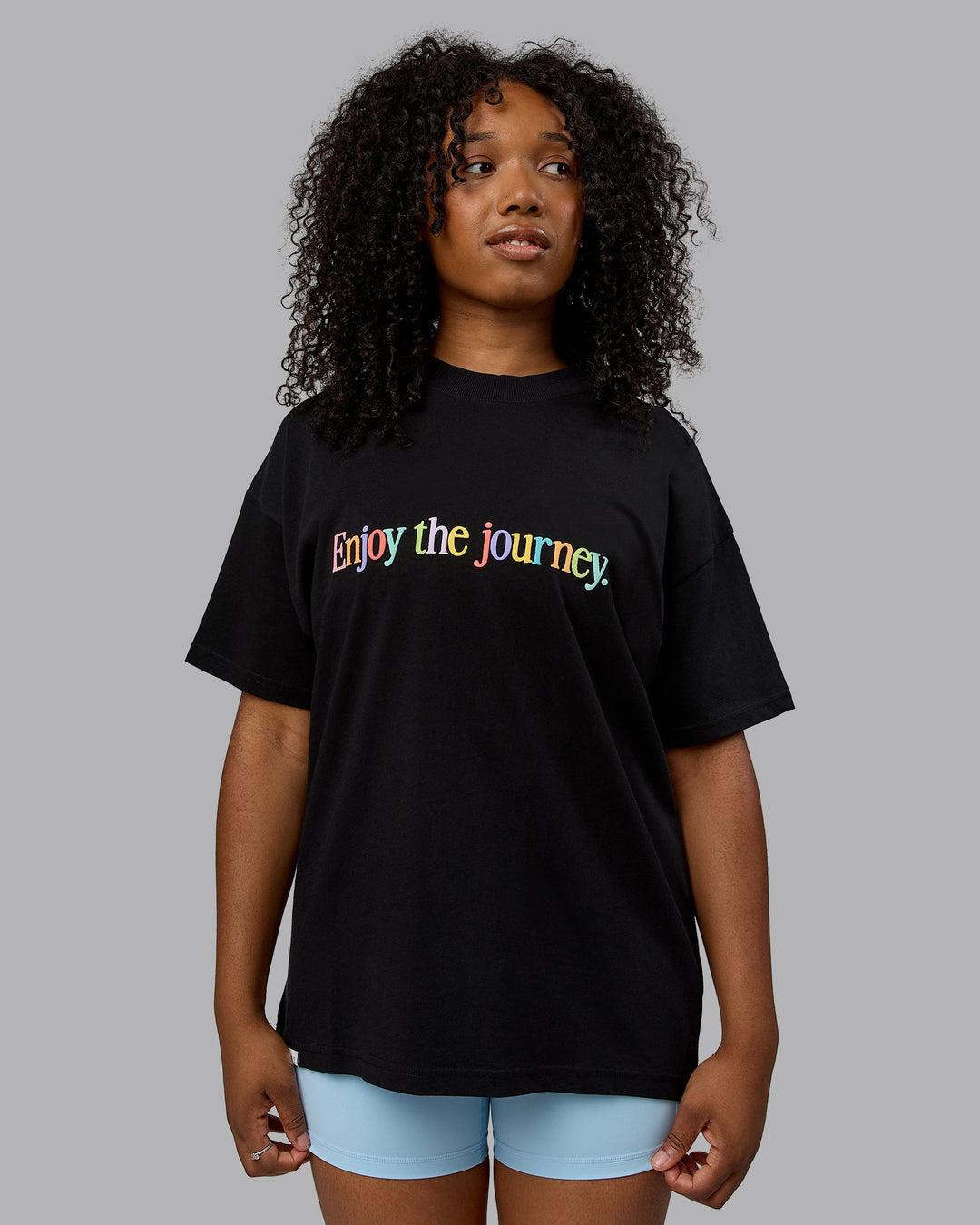 Woman wearing Unisex Enjoy The Journey Heavyweight Tee Oversize - Black-Multi