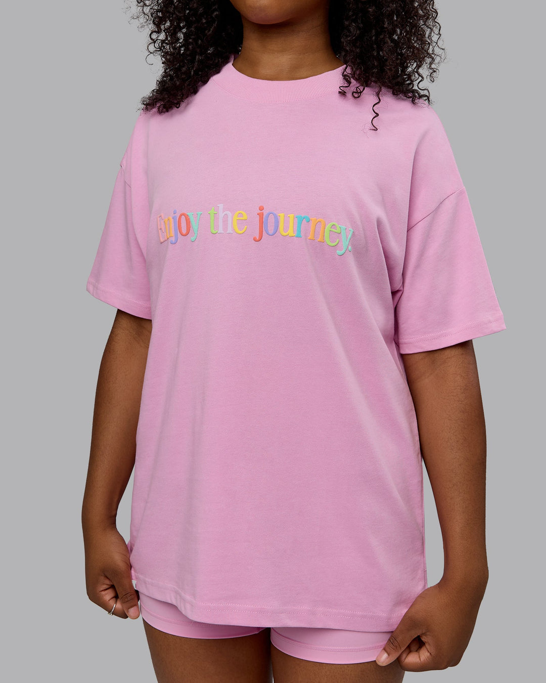 Woman wearing Unisex Enjoy The Journey Heavyweight Tee Oversize - Bubblegum-Multi