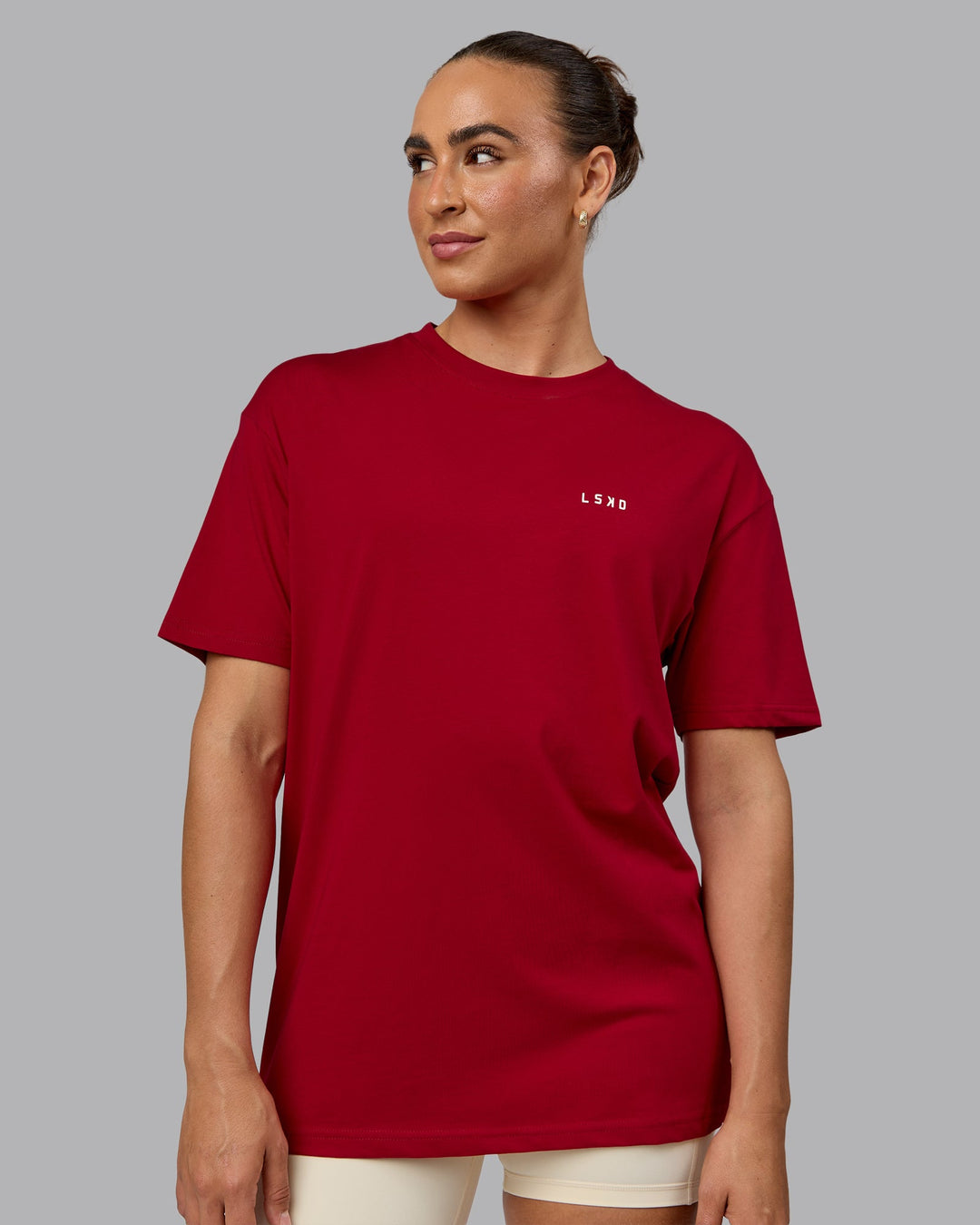 Woman wearing Unisex Enjoy the Journey Value Series FLXCotton Tee Oversize - Cherry Red-Ivory