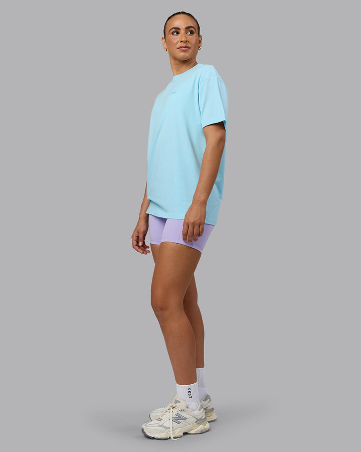 Woman wearing Unisex Enjoy the Journey Value Series FLXCotton Tee Oversize - Crystal Blue-Bay Blue
